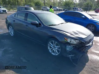 2015 Mazda 6 i Touring with VIN JM1GJ1V53F1221827, listed as a IAAI auction lot 42439288 with 153,269 mi miles and . Bid and sale history available at DreamBid. Image 1.