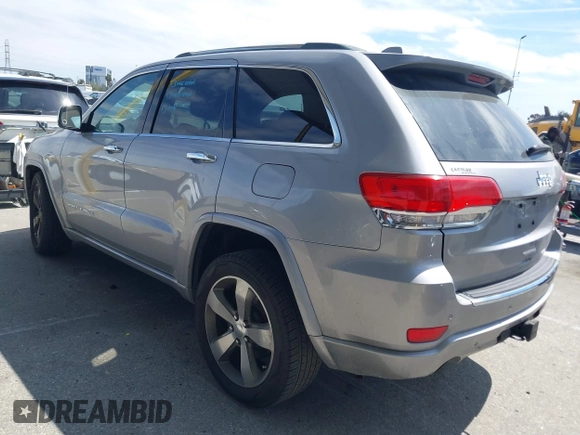 2014 Jeep Grand Cherokee Overland with VIN 1C4RJECG0EC291048, listed as a IAAI auction lot 41883941 with 81,871 mi miles. Bid and sale history available at carsss.com. Image 3.