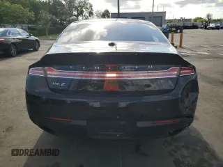 2016 Lincoln MKZ z VIN 3LN6L2G97GR614647, wystawiony jako Copart lot #55955655 z przebiegiem 142 655 mil mil oraz Szkoda całkowita • Salvage title. Historia ofert i sprzedaży dostępna na DreamBid. Obrazek 6.
