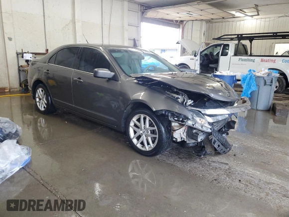 2011 Ford Fusion SEL with VIN 3FAHP0JA8BR179984, listed as a Copart auction lot 54358945 with 183,064 mi miles and Salvage Title. Bid and sale history available at DreamBid. Image 4.
