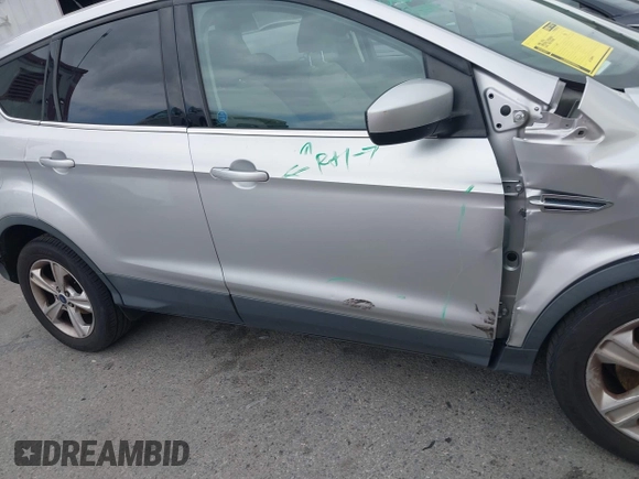 2015 Ford Escape SE with VIN 1FMCU0G95FUC81490, listed as a IAAI auction lot 42136791 with 140,967 mi miles. Bid and sale history available at carsss.com. Image 13.