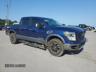 2017 Nissan Titan Pro-4X with VIN 1N6AA1E5XHN544948, listed as a Copart auction lot 61851175 with 216,797 mi miles and Clean title. Bid and sale history available at DreamBid. Image 4.