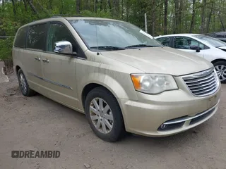 2011 Chrysler Town & Country Touring-L with VIN 2A4RR8DG1BR703726, listed as a IAAI auction lot 42134668 with 133,329 mi miles. Bid and sale history available at carsss.com. Image 1.