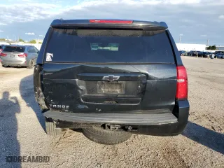 2019 Chevrolet Tahoe LT with VIN 1GNSCBKC0KR266577, listed as a Copart auction lot 79674694 with 75,002 mi miles and Salvage Title. Bid and sale history available at carsss.com. Image 6.