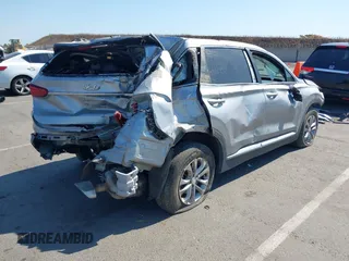2020 Hyundai Santa Fe SE z VIN 5NMS2CAD1LH221326, wystawiony jako IAAI lot #42442177 z przebiegiem 68 995 mil mil oraz . Historia ofert i sprzedaży dostępna na DreamBid. Obrazek 4.