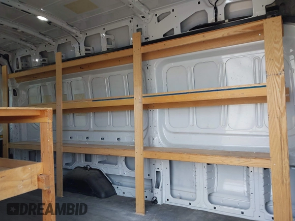 2020 Ford Transit Cargo with VIN 1FTBW3UGXLKA14030, listed as a IAAI auction lot 42505110 with 169,612 mi miles and . Bid and sale history available at DreamBid. Image 8.