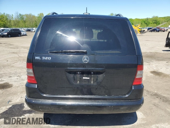 2001 Mercedes-Benz M-Class with VIN 4JGAB54E61A232157, listed as a Copart auction lot 53482584 with 137,549 mi miles and Salvage Title. Bid and sale history available at carsss.com. Image 6.