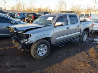 2021 Toyota Tacoma SR z VIN 3TMCZ5AN5MM386394, wystawiony jako IAAI lot #41821364 z przebiegiem 54 070 mil mil oraz . Historia ofert i sprzedaży dostępna na DreamBid. Obrazek 18.
