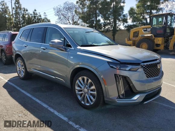 2023 Cadillac XT6 FWD Premium Luxury z VIN 1GYKPCRS5PZ212337, wystawiony jako Copart lot #46283655 z przebiegiem 15 660 mil mil oraz Szkody całkowita. Historia ofert i sprzedaży dostępna na DreamBid. Obrazek 4.