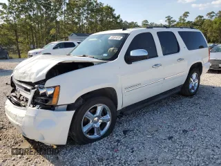 2014 Chevrolet Suburban LTZ with VIN 1GNSCKE0XER132827, listed as a Copart auction lot 50581815 with 71,480 mi miles and Salvage title. Bid and sale history available at DreamBid. Image 1.