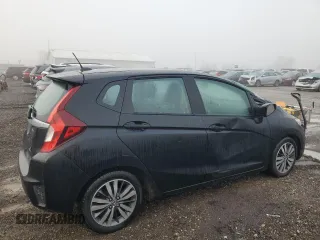 2015 Honda Fit EX-L with VIN 3HGGK5H82FM703509, listed as a Copart auction lot 86336004 with 155,193 mi miles and Salvage Title. Bid and sale history available at DreamBid. Image 3.