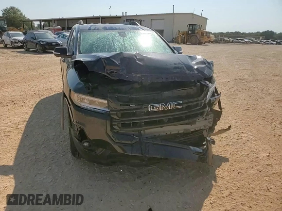 2023 GMC Acadia SLT with VIN 1GKKNMLS7PZ253048, listed as a Copart auction lot 74921474 with 10,084 mi miles and Salvage Title. Bid and sale history available at DreamBid. Image 14.
