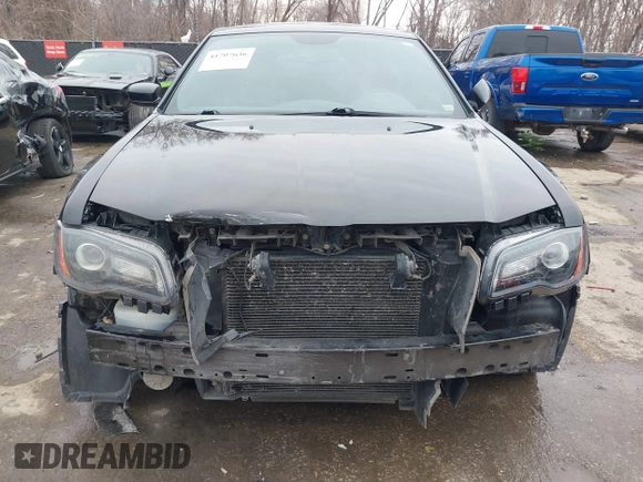 2014 Chrysler 300 S with VIN 2C3CCABG9EH373159, listed as a IAAI auction lot 41707636 with 218,045 mi miles and . Bid and sale history available at DreamBid. Image 6.