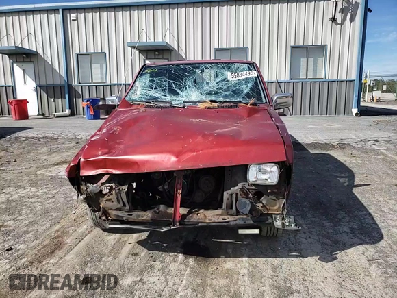 1996 Nissan Frontier XE with VIN 1N6SD16S8TC335129, listed as a Copart auction lot 55884495 with 313,757 mi miles and Salvage title. Bid and sale history available at DreamBid. Image 13.