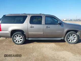 2012 GMC Yukon XL SLT with VIN 1GKS2KE73CR167820, listed as a IAAI auction lot 41462950 with 243,554 mi miles. Bid and sale history available at carsss.com. Image 13.