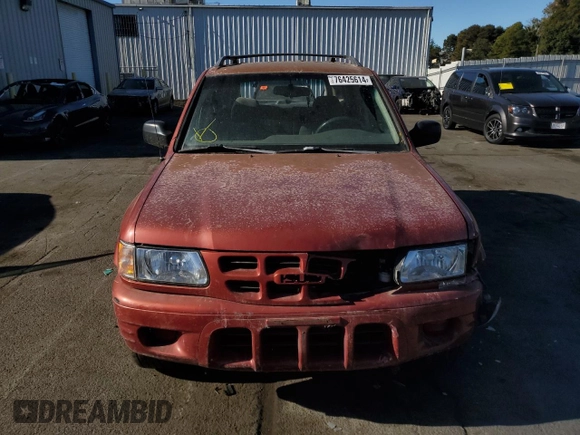 2001 Isuzu Rodeo S with VIN 4S2CK58W014302125, listed as a Copart auction lot 76425614 with 204,350 mi miles and Salvage title. Bid and sale history available at DreamBid. Image 5.