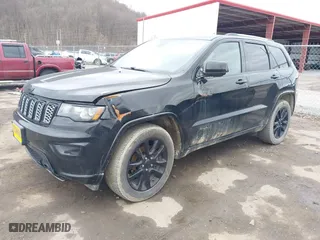 2018 Jeep Grand Cherokee Laredo E with VIN 1C4RJFAG3JC324434, listed as a IAAI auction lot 41812311 with 140,820 mi miles. Bid and sale history available at carsss.com. Image 2.