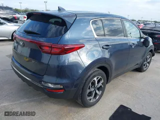 2020 Kia Sportage LX with VIN KNDPM3ACXL7719197, listed as a IAAI auction lot 41733259 with 57,888 mi miles. Bid and sale history available at carsss.com. Image 4.