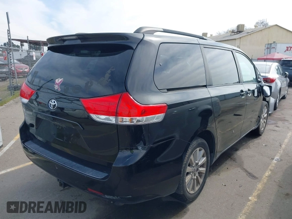 2012 Toyota Sienna LE with VIN 5TDJK3DC0CS037989, listed as a IAAI auction lot 41622546 with 165,363 mi miles. Bid and sale history available at carsss.com. Image 4.