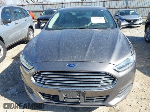 2014 Ford Fusion S with VIN 1FA6P0G79E5360991, listed as a IAAI auction lot 41884597 with 244,786 mi miles and . Bid and sale history available at DreamBid. Image 6.