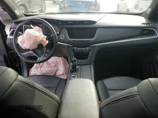 2023 Cadillac XT5 FWD Premium Luxury z VIN 1GYKNCRS6PZ145494, wystawiony jako Copart lot #45475375 z przebiegiem 48 339 mil mil oraz Szkoda całkowita • Salvage title. Historia ofert i sprzedaży dostępna na DreamBid. Obrazek 8.