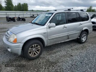 2006 Suzuki XL7 z VIN JS3TX92V564102483, wystawiony jako Copart lot #57185865 z przebiegiem 152 864 mil mil oraz Szkoda całkowita • Salvage title. Historia ofert i sprzedaży dostępna na DreamBid. Obrazek 1.