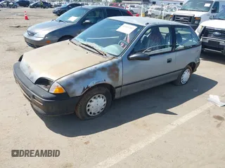 1994 Geo Metro z VIN 2C1MR2465R6726696, wystawiony jako IAAI lot #42053202 z przebiegiem 124 775 mil mil oraz . Historia ofert i sprzedaży dostępna na DreamBid. Obrazek 2.