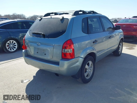2006 Hyundai Tucson GL with VIN KM8JM12B76U276847, listed as a IAAI auction lot 41767240 with 204,713 mi miles. Bid and sale history available at carsss.com. Image 4.