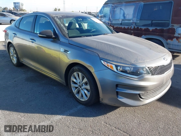 2018 Kia Optima LX with VIN 5XXGT4L32JG256921, listed as a IAAI auction lot 41389850 with 91,013 mi miles and . Bid and sale history available at DreamBid. Image 1.