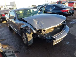 2007 Ford Mustang Deluxe z VIN 1ZVFT80N975302845, wystawiony jako IAAI lot #41615150 z przebiegiem Nie podano mil oraz . Historia ofert i sprzedaży dostępna na DreamBid. Obrazek 1.