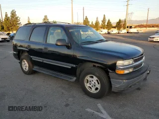 2005 Chevrolet Tahoe LS with VIN 1GNEC13T65R254833, listed as a Copart auction lot 77916164 with 164,550 mi miles and Salvage Title. Bid and sale history available at carsss.com. Image 4.
