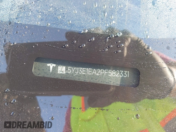 2023 Tesla Model 3 with VIN 5YJ3E1EA2PF582331, listed as a IAAI auction lot 41043858 with 33,601 mi miles and . Bid and sale history available at DreamBid. Image 9.