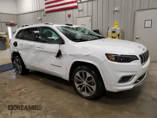 2019 Jeep Cherokee Overland with VIN 1C4PJMJN5KD173943, listed as a Copart auction lot 48350505 with 54,917 mi miles and Salvage title. Bid and sale history available at DreamBid. Image 4.