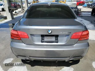 2011 BMW 3 Series 335is with VIN WBAKG1C52BE617713, listed as a Copart auction lot 74064204 with 132,742 mi miles and Salvage Title. Bid and sale history available at carsss.com. Image 6.