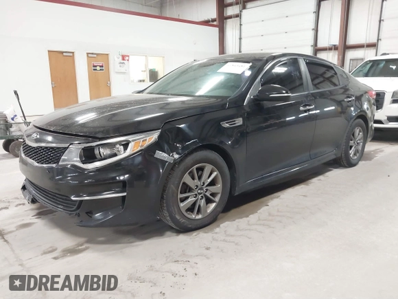 2016 Kia Optima LX Turbo with VIN 5XXGT4L16GG013751, listed as a IAAI auction lot 41843481 with 163,969 mi miles. Bid and sale history available at carsss.com. Image 2.
