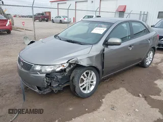 2012 Kia Forte EX with VIN KNAFU4A24C5632655, listed as a IAAI auction lot 41932379 with 146,273 mi miles. Bid and sale history available at carsss.com. Image 18.