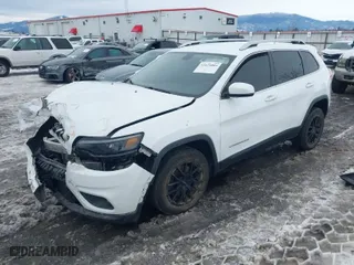 2019 Jeep Cherokee Altitude with VIN 1C4PJLLX9KD416808, listed as a IAAI auction lot 41625084 with 67,544 mi miles. Bid and sale history available at carsss.com. Image 2.