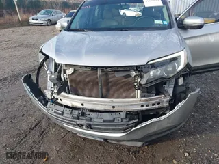 2018 Honda Pilot EX-L with VIN 5FNYF6H59JB026068, listed as a IAAI auction lot 41458049 with 128,769 mi miles. Bid and sale history available at carsss.com. Image 6.