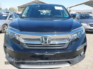 2020 Honda Pilot EX-L with VIN 5FNYF5H54LB009448, listed as a IAAI auction lot 41697106 with 63,310 mi miles. Bid and sale history available at carsss.com. Image 12.
