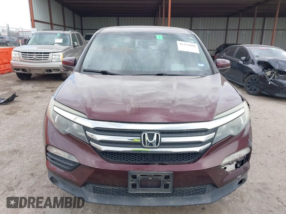 2016 Honda Pilot EX-L with VIN 5FNYF5H58GB026209, listed as a IAAI auction lot 41333088 with 129,484 mi miles and . Bid and sale history available at DreamBid. Image 12.