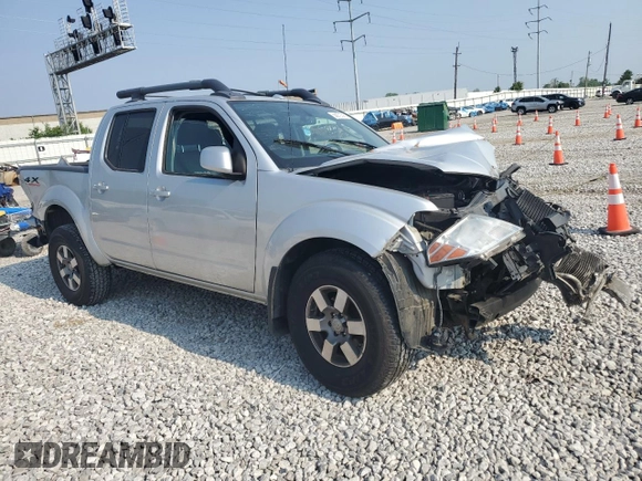 2011 Nissan Frontier Pro-4X with VIN 1N6AD0EV4BC411851, listed as a Copart auction lot 58972745 with Not provided miles and Salvage title. Bid and sale history available at DreamBid. Image 4.