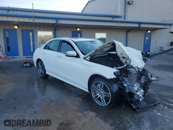 2019 Mercedes-Benz E-Class E 300 with VIN WDDZF4JB8KA497945, listed as a Copart auction lot 87875545 with 52,511 mi miles and Salvage Title. Bid and sale history available at carsss.com. Image 4.