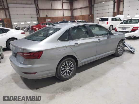 2021 Volkswagen Jetta S with VIN 3VWC57BU1MM052003, listed as a IAAI auction lot 41910900 with 31,263 mi miles and . Bid and sale history available at DreamBid. Image 4.