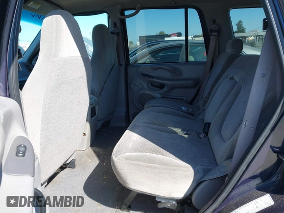 1999 Ford Expedition XLT z VIN 1FMPU18L3XLA96802, wystawiony jako IAAI lot #41784864 z przebiegiem Nie podano mil oraz . Historia ofert i sprzedaży dostępna na DreamBid. Obrazek 8.