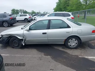 2001 Toyota Camry CE z VIN 4T1BG22K41U847401, wystawiony jako IAAI lot #42275762 z przebiegiem 202 936 mil mil oraz . Historia ofert i sprzedaży dostępna na DreamBid. Obrazek 14.