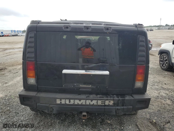 2003 Hummer H2 with VIN 5GRGN23UX3H121939, listed as a Copart auction lot 69503424 with 170,144 mi miles and Salvage Title. Bid and sale history available at carsss.com. Image 6.