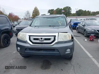 2011 Honda Pilot EX-L z VIN 5FNYF3H52BB046999, wystawiony jako IAAI lot #40854435 z przebiegiem 179 852 mil mil oraz . Historia ofert i sprzedaży dostępna na DreamBid. Obrazek 12.