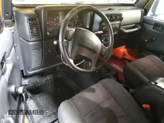 2003 Jeep Wrangler Rubicon with VIN 1J4FA69S23P322353, listed as a Copart auction lot 43915745 with 117,769 mi miles and Salvage title. Bid and sale history available at DreamBid. Image 8.