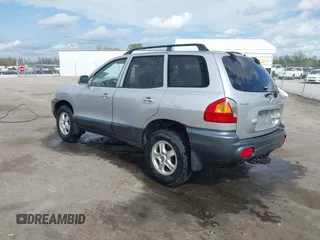 2002 Hyundai Santa Fe GLS with VIN KM8SC73D62U209998, listed as a IAAI auction lot 41915060 with 228,451 mi miles. Bid and sale history available at carsss.com. Image 3.