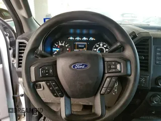 2019 Ford F-150 XL with VIN 1FTFW1E54KKE85396, listed as a IAAI auction lot 42174957 with 126,732 mi miles. Bid and sale history available at carsss.com. Image 1.